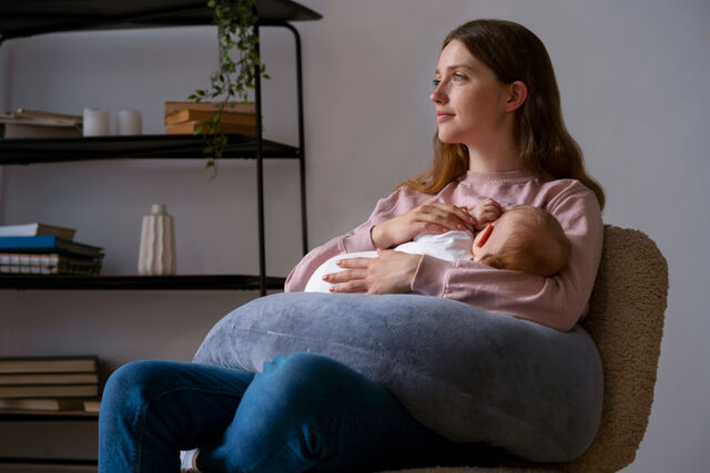 woman with newborn child