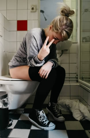 Girl Peeing In Toilet